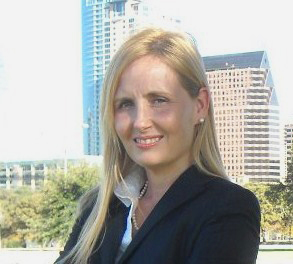 Jodi Cole and the Austin skyline